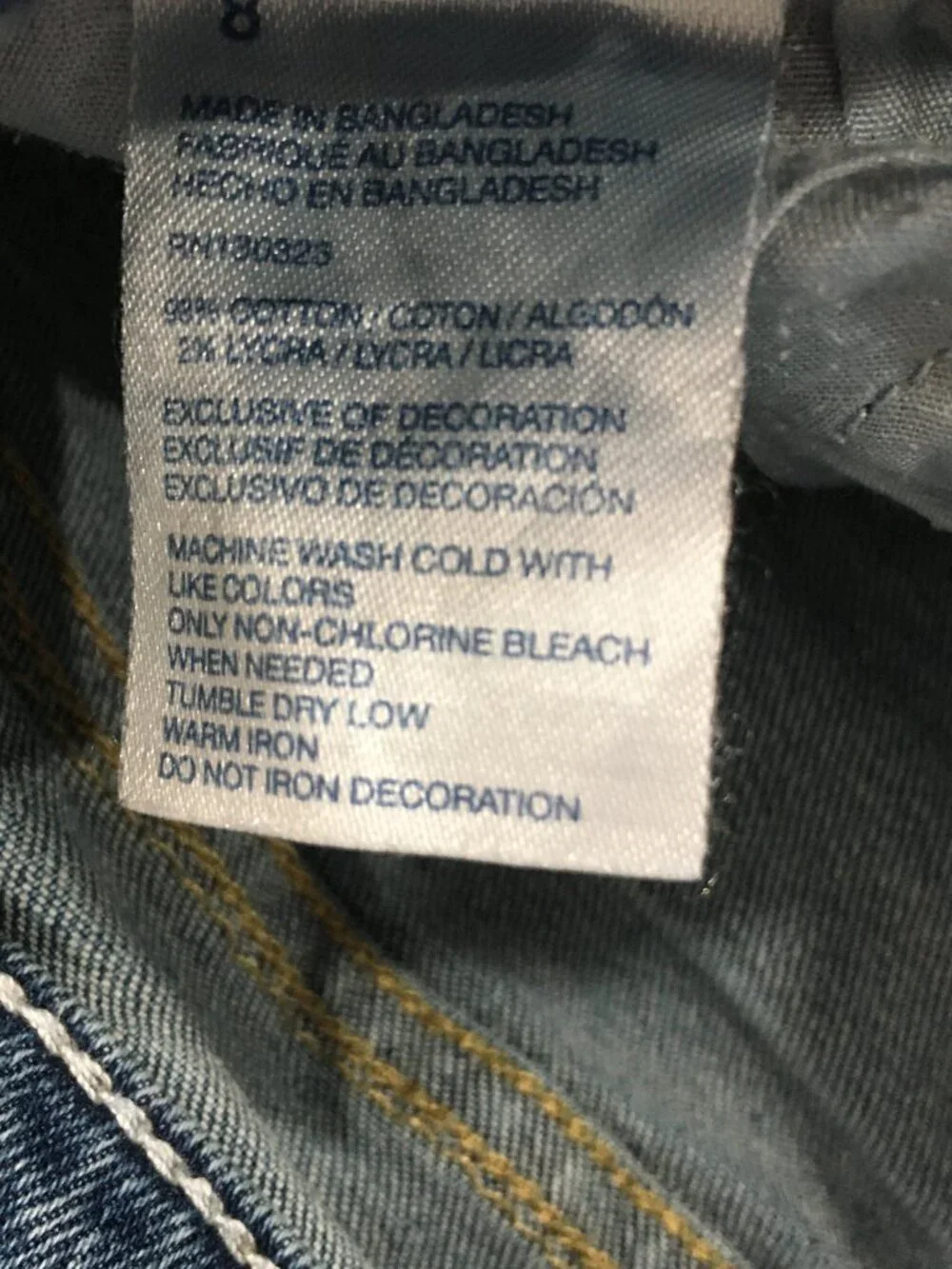 TOMMY HILFIGER Distressed Cut Step Hem Adj Waist Distressed Applique Logo Jeans